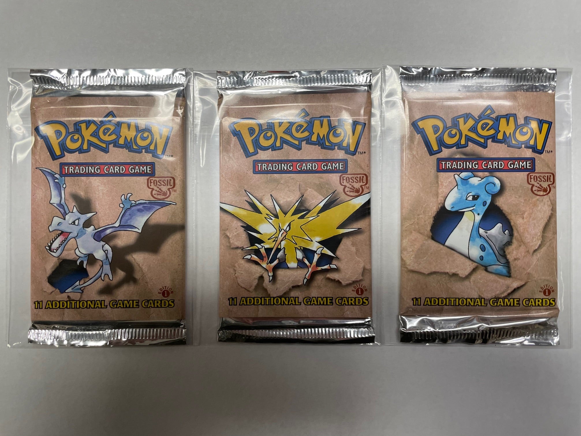 CALL STORE FOR INQUIRIES** POKEMON FOSSIL FIRST EDITION BOOSTER PACK Cards and Comics Central CALL STORE FOR INQUIRIES** POKEMON FOSSIL FIRST EDITION BOOSTER PACK Cards and Comics Central