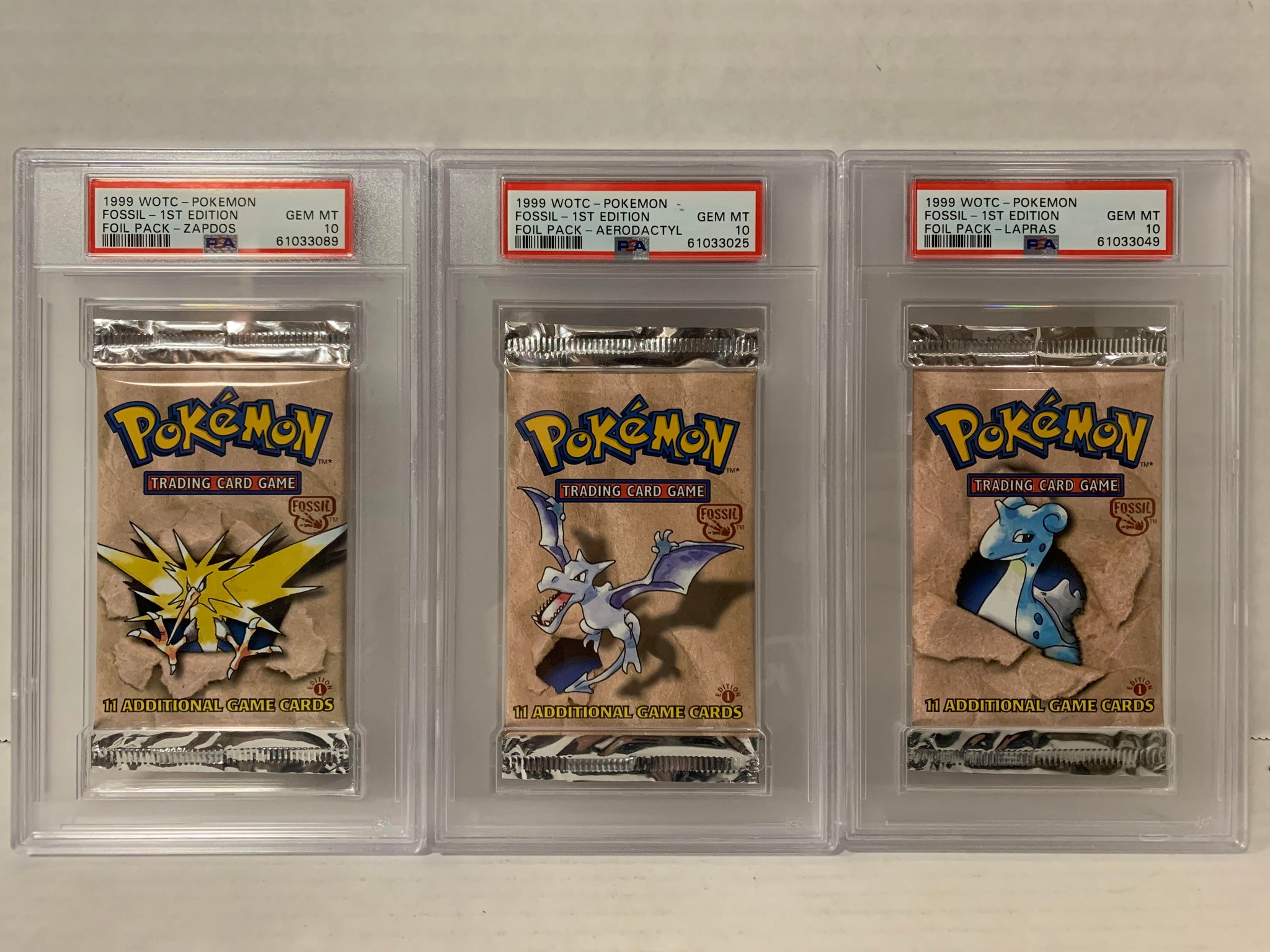 PSA 10 POKEMON FOSSIL FIRST EDITION BOOSTER PACK SET AERODACTYL